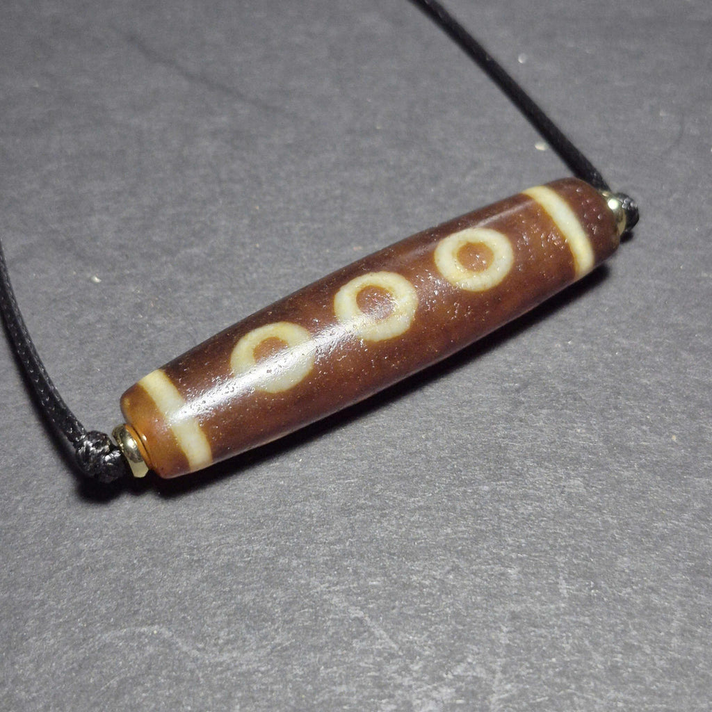 Red 5 Eye Tibetan Dzi Bead with Strong Weathered Patina and Clear Eyes