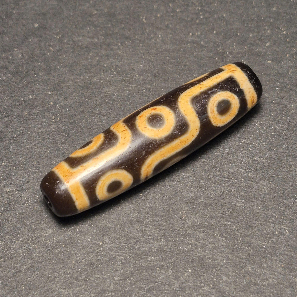 Ancient 9 Eyes Tibetan Dzi Bead, Deeply Weathered and Highly Collectible