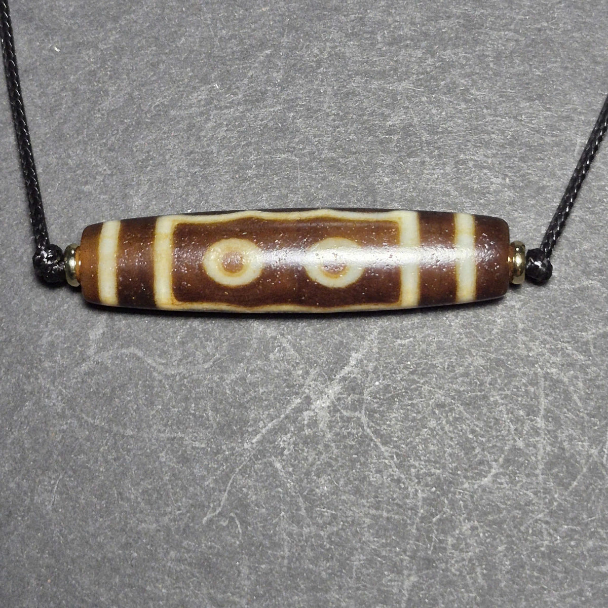 Red 5 Eye Tibetan Dzi Bead with Strong Weathered Patina and Clear Eyes