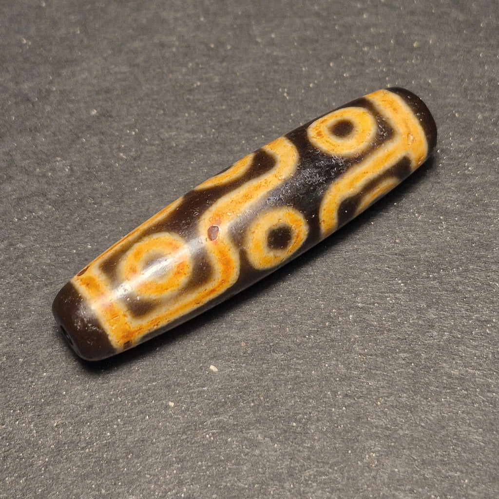 Ancient 9 Eyes Tibetan Dzi Bead, Deeply Weathered and Highly Collectible