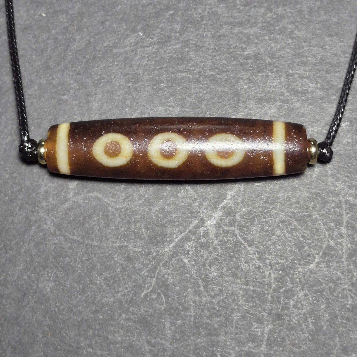 Red 5 Eye Tibetan Dzi Bead with Strong Weathered Patina and Clear Eyes