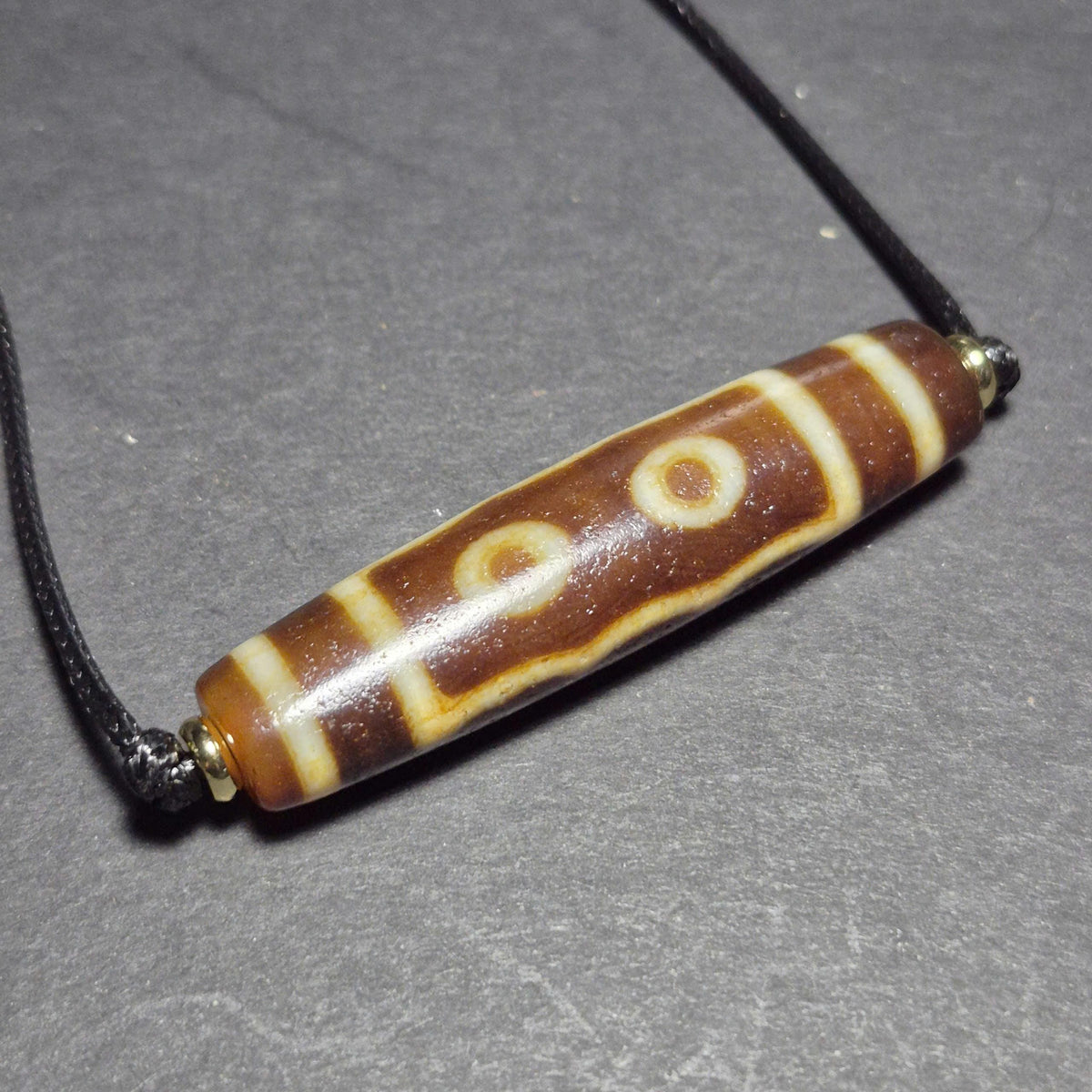 Red 5 Eye Tibetan Dzi Bead with Strong Weathered Patina and Clear Eyes