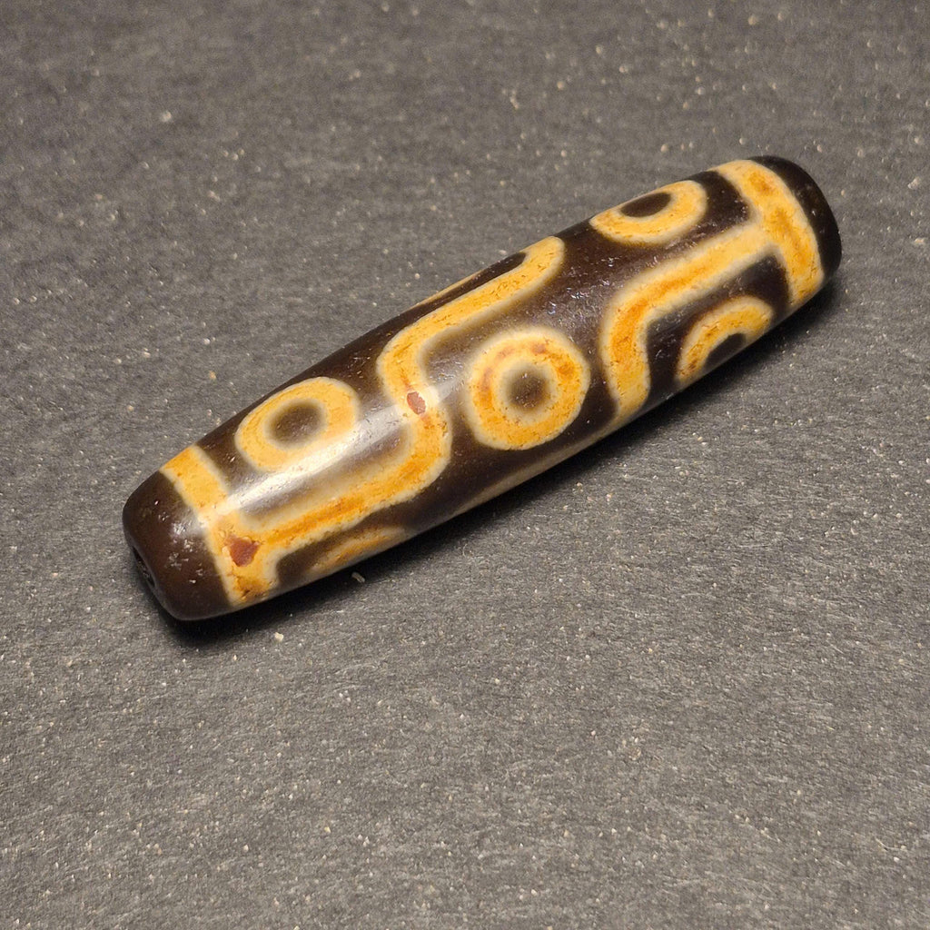 Ancient 9 Eyes Tibetan Dzi Bead, Deeply Weathered and Highly Collectible