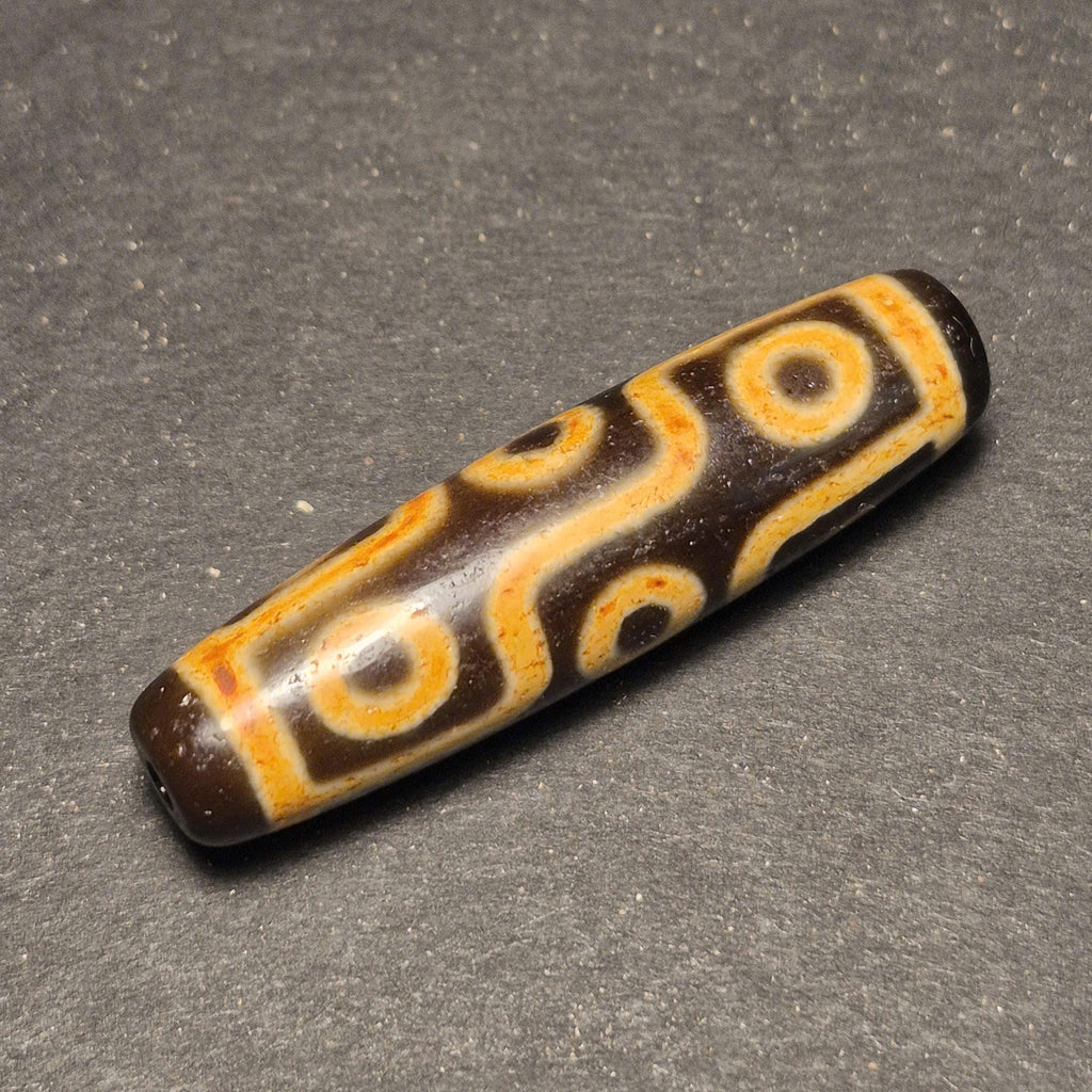 Ancient 9 Eyes Tibetan Dzi Bead, Deeply Weathered and Highly Collectible